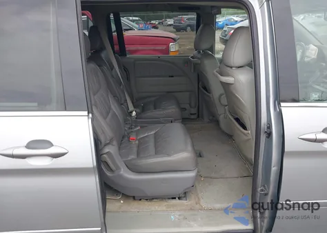 2010 Honda Odyssey Ex-L z USA, uszkodzony, nr VIN 5FNRL3H75AB057282